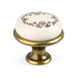 Pomolo a bottone LUNAS / Ottone antico – motivo ornamentale