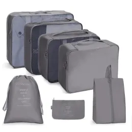 Set da viaggio 7 pezzi per abbigliamento e cosmetici TRAVEL / Grigio