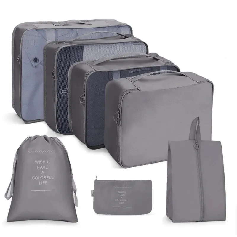 Set da viaggio 7 pezzi per abbigliamento e cosmetici TRAVEL / Grigio