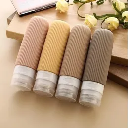 Set da viaggio di flaconi in silicone per cosmetici EMPORA / Oro