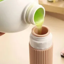 Set da viaggio di flaconi in silicone per cosmetici EMPORA / Oro
