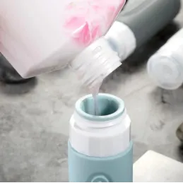 Set da viaggio di flaconi in silicone per cosmetici EMPORA / Nero