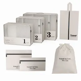 Set da viaggio da 7 pezzi per abbigliamento e cosmetici TRAVEL LUX / Bianco