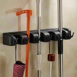 Portascopa universale per scope e mop / Nero