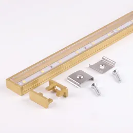 Kit da 1 m di profilo ZARIA per illuminazione LED con copertura trasparente, tappi e sistema di fissaggio / Oro