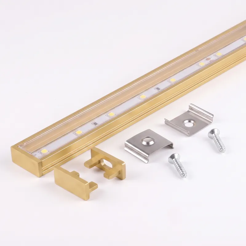 Kit da 1 m di profilo ZARIA per illuminazione LED con copertura trasparente, tappi e sistema di fissaggio / Oro